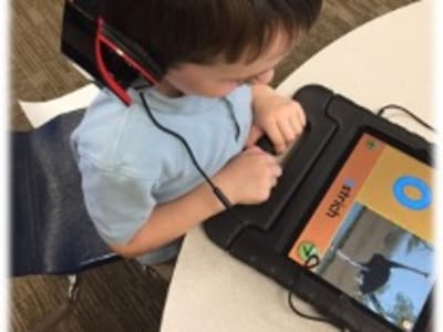 Kindergarten students using classroom technology
