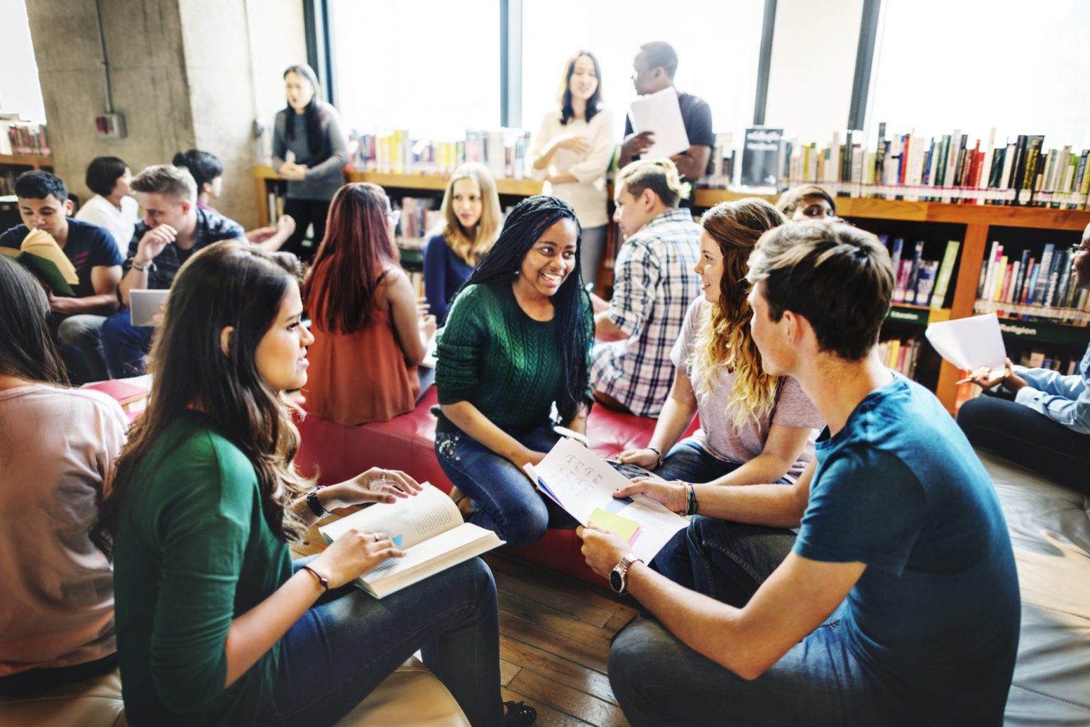 Students studying together in a library