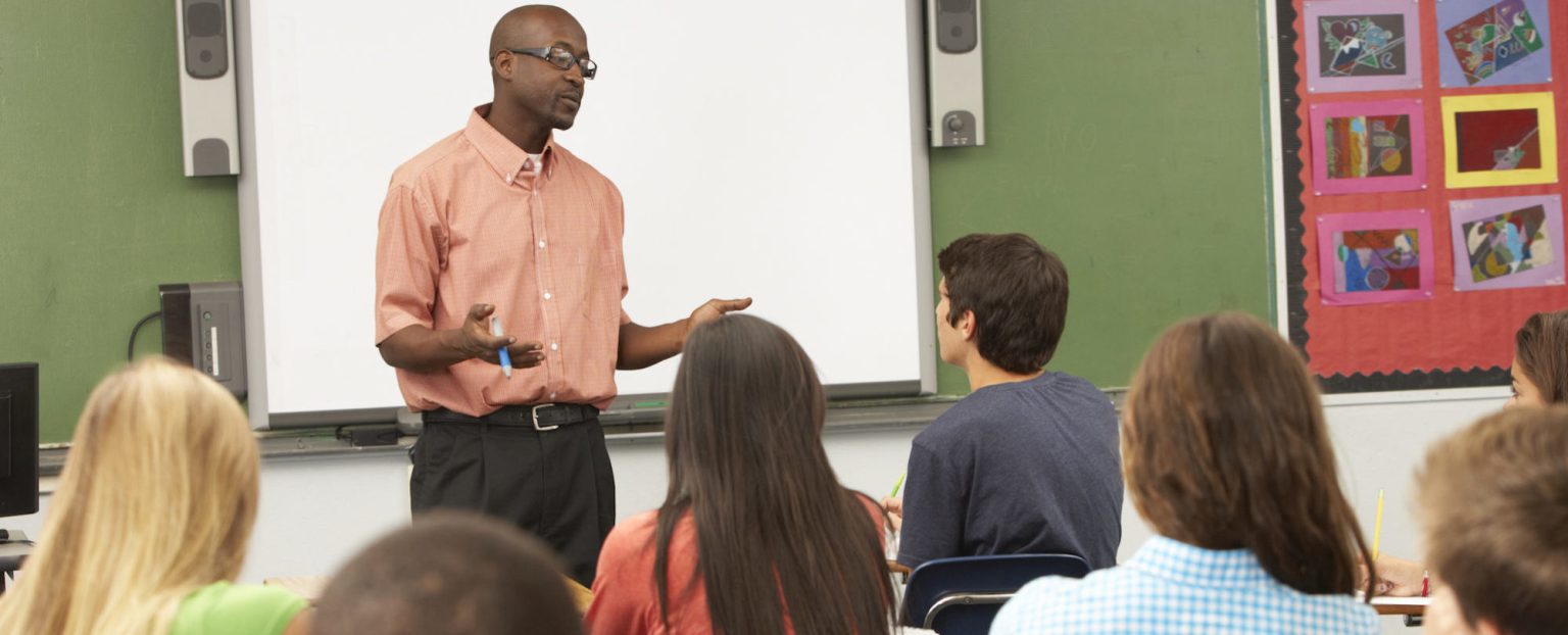 Pike teacher leading a high school classroom discussion
